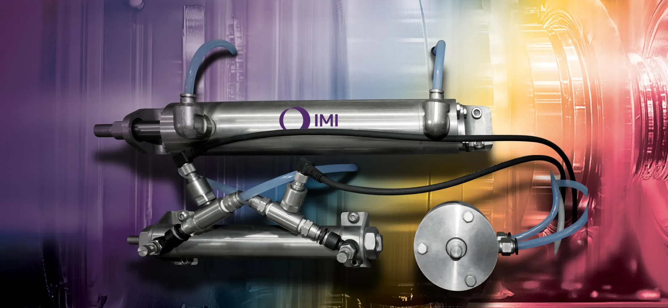 Bimba air cylinder in front of a colourful background